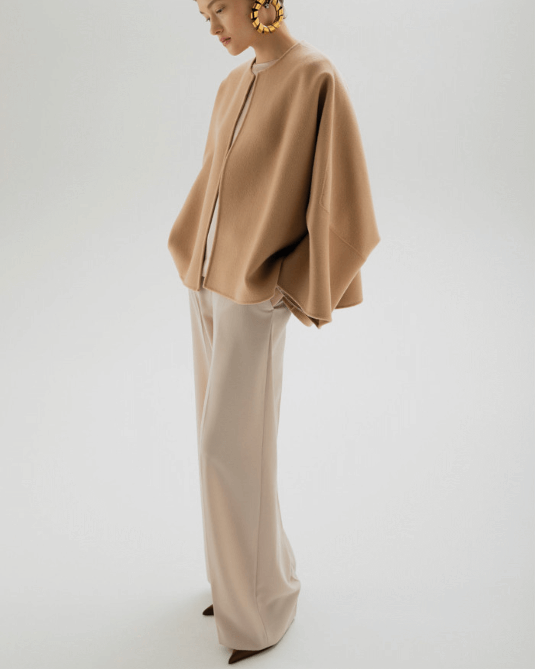 FFC broek en poncho in lichte tinten